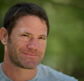 Steve Backshall holding a baby Alligator