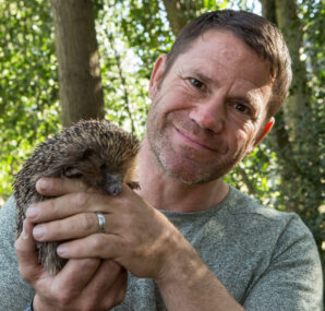 Steve Backshall holding a baby Alligator